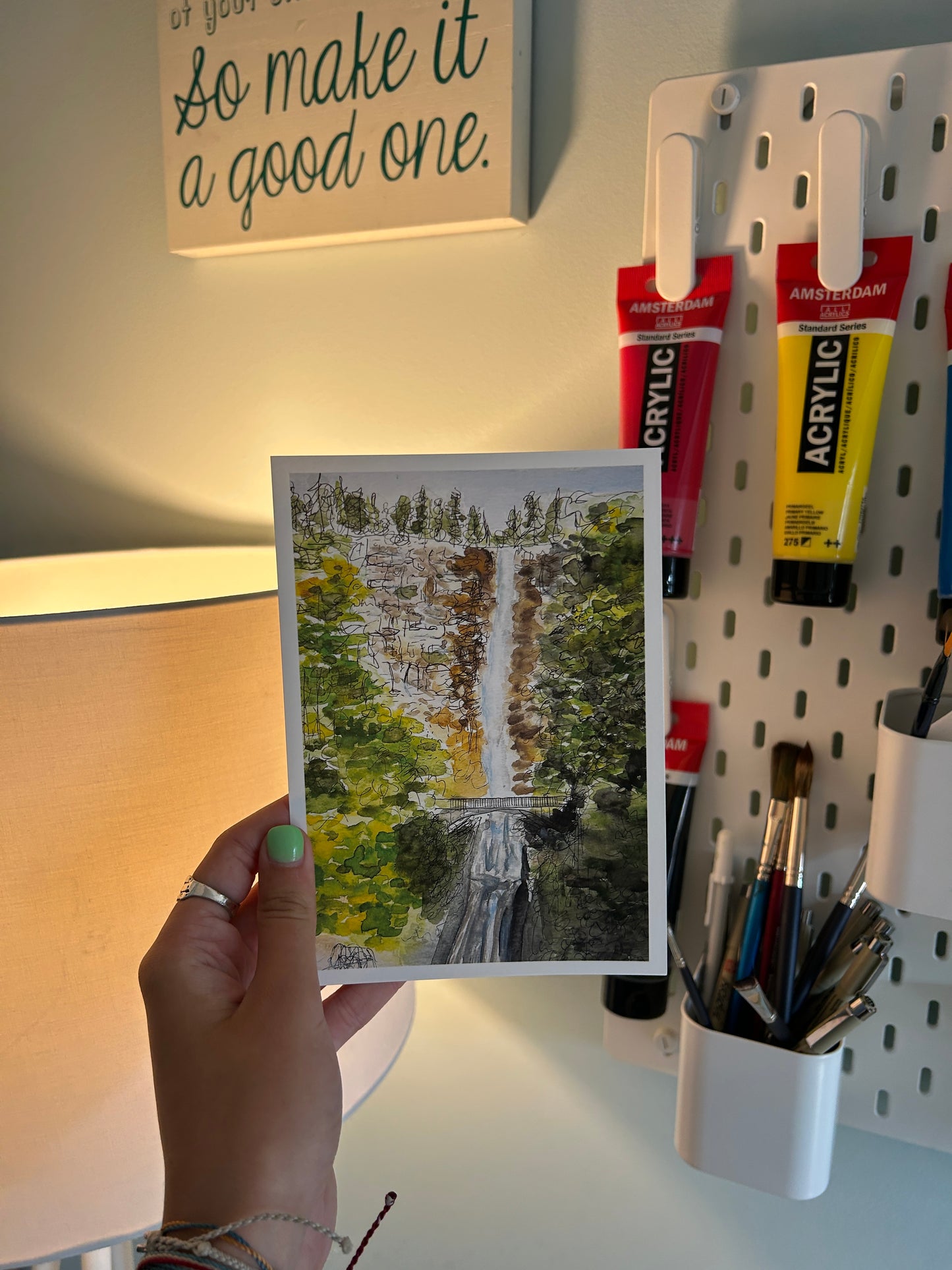 "a bridge and a waterfall"