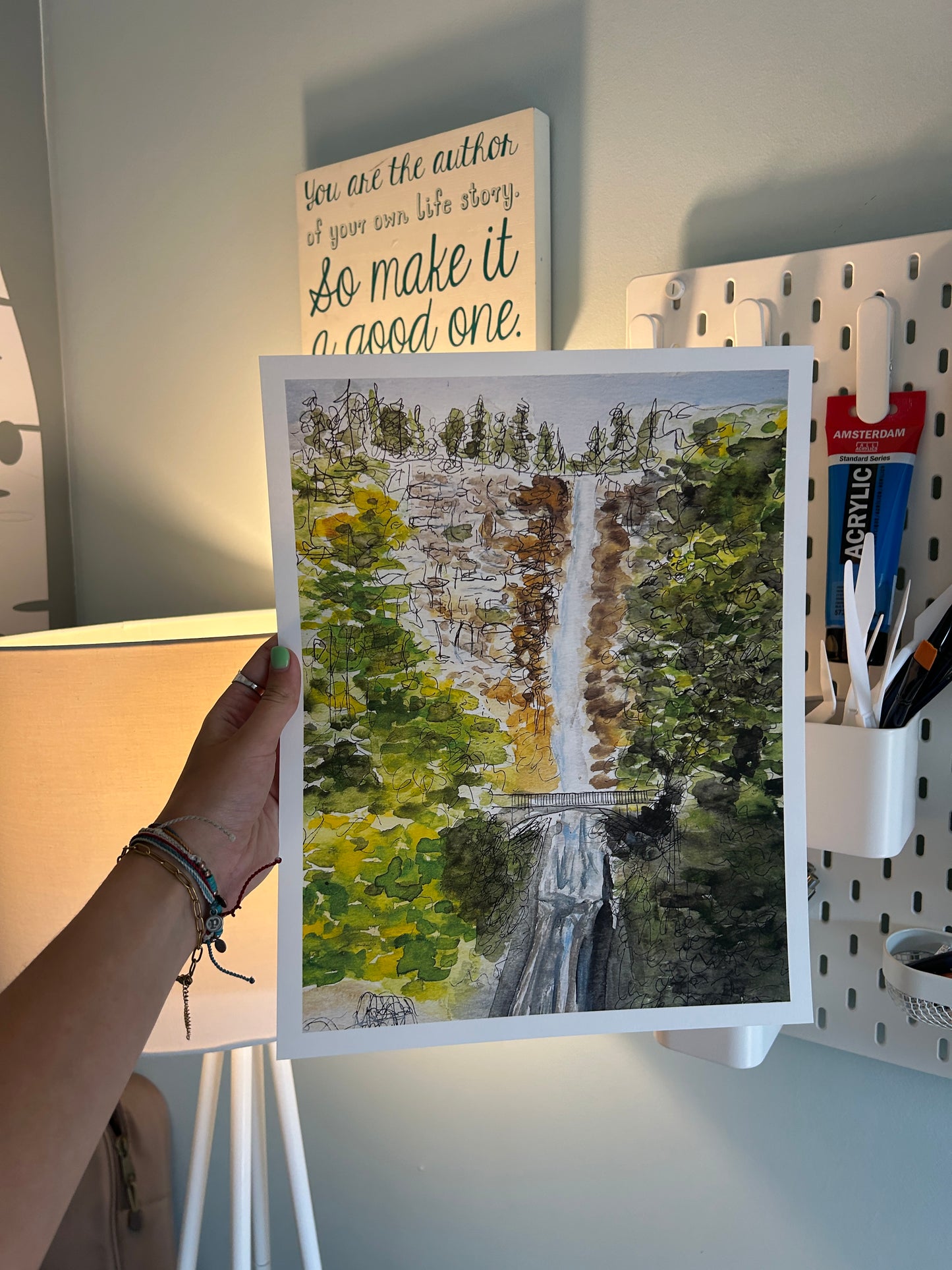 "a bridge and a waterfall"